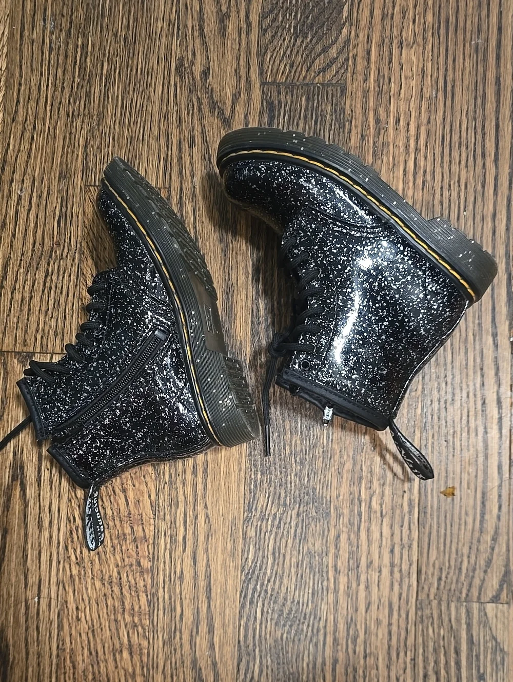 Dr. Martens 1460 Glitter Lace Up Boots in black cosmic glitter